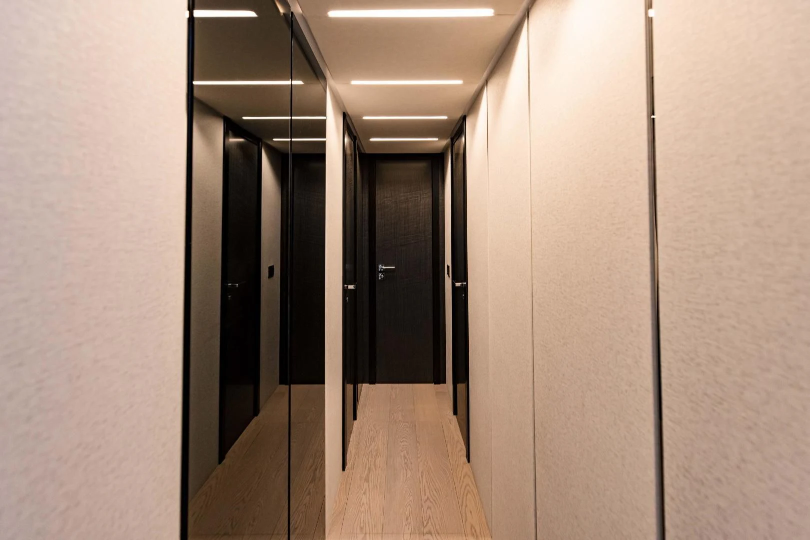 a hallway with doors aboard STALLION Yacht for Sale