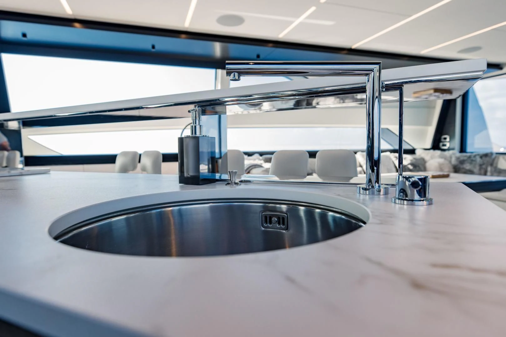 a large round black object on a wooden surface aboard STALLION Yacht for Sale
