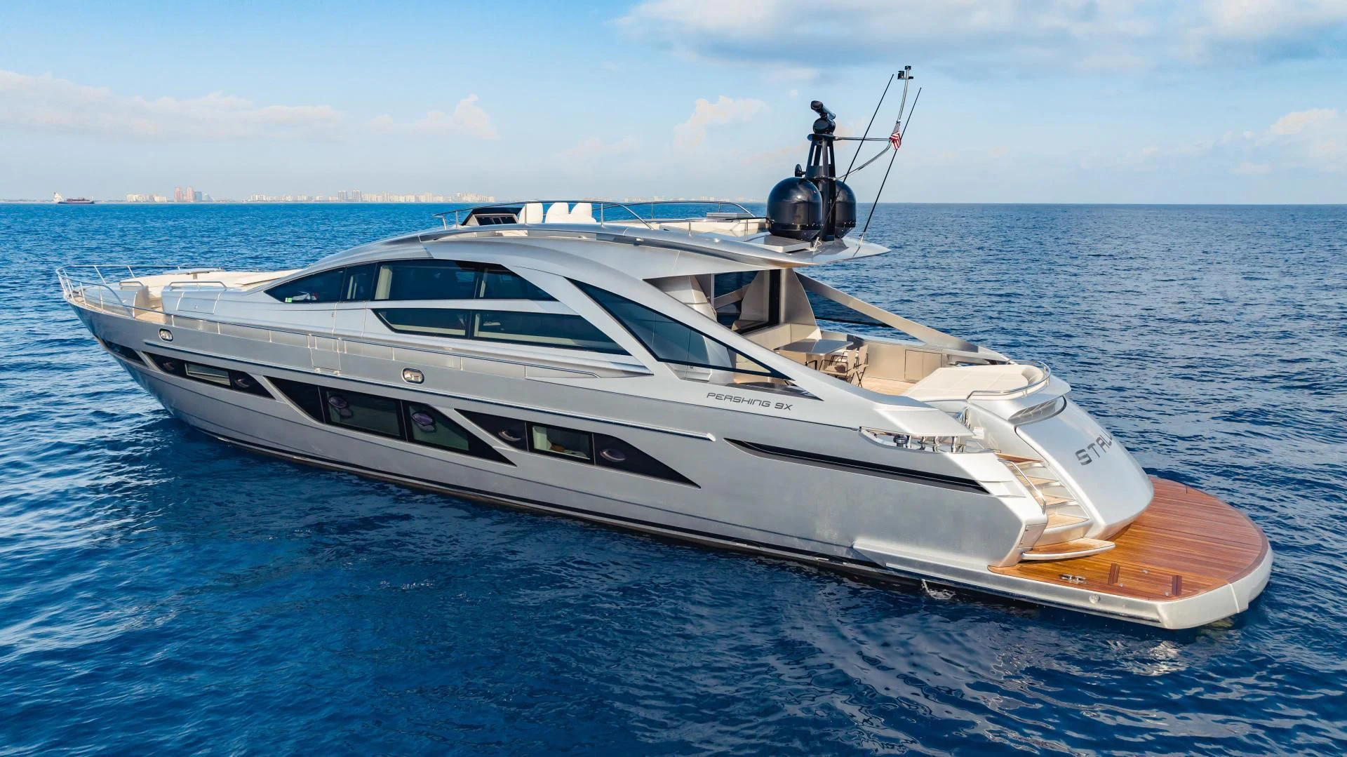 a white yacht on the water aboard STALLION Yacht for Sale