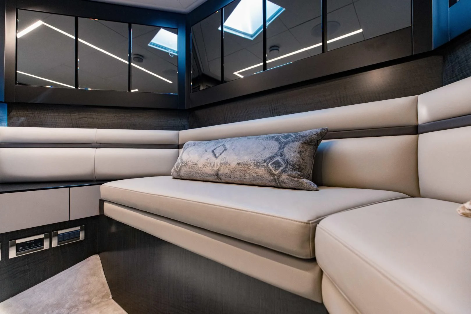 a couch with a pillow on it aboard STALLION Yacht for Sale