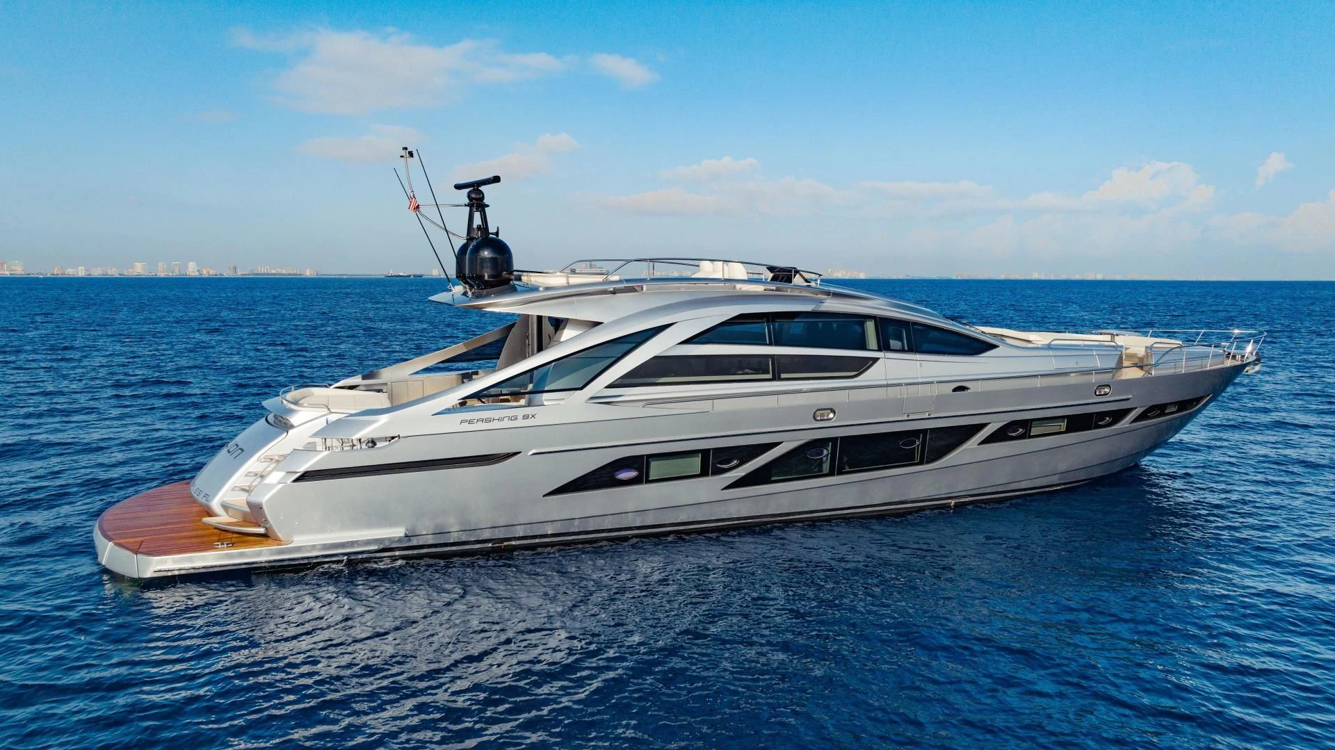 a white yacht in the water aboard STALLION Yacht for Sale