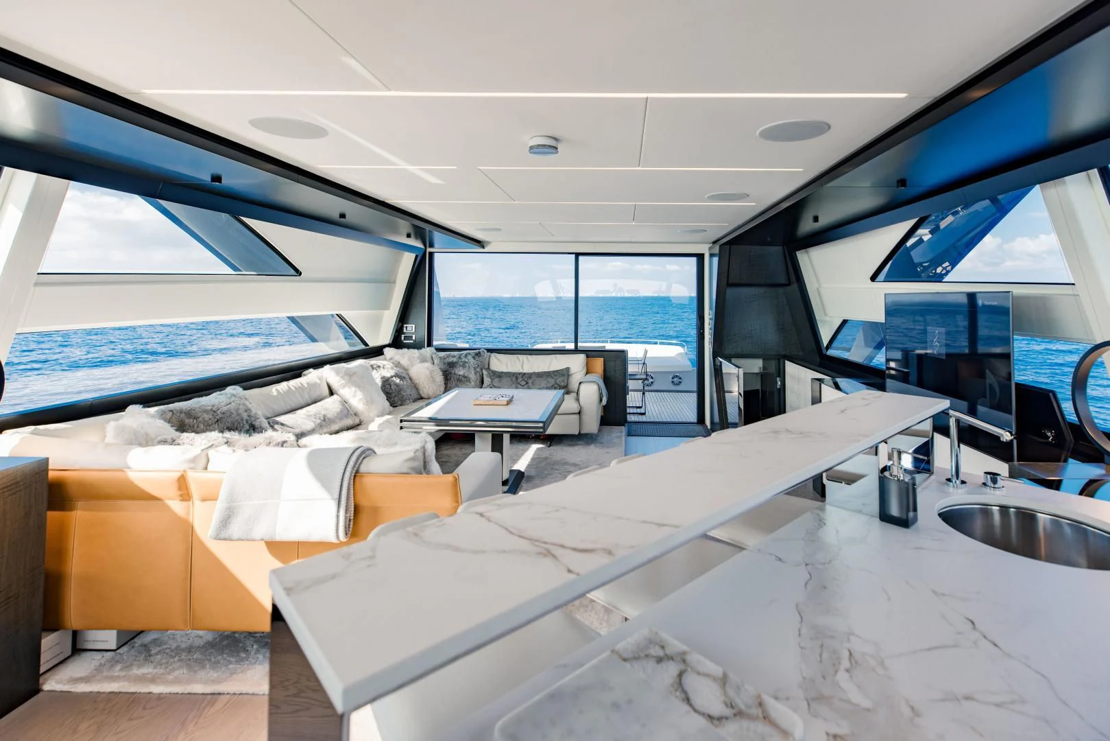 a room with a large window and a view of the ocean aboard STALLION Yacht for Sale