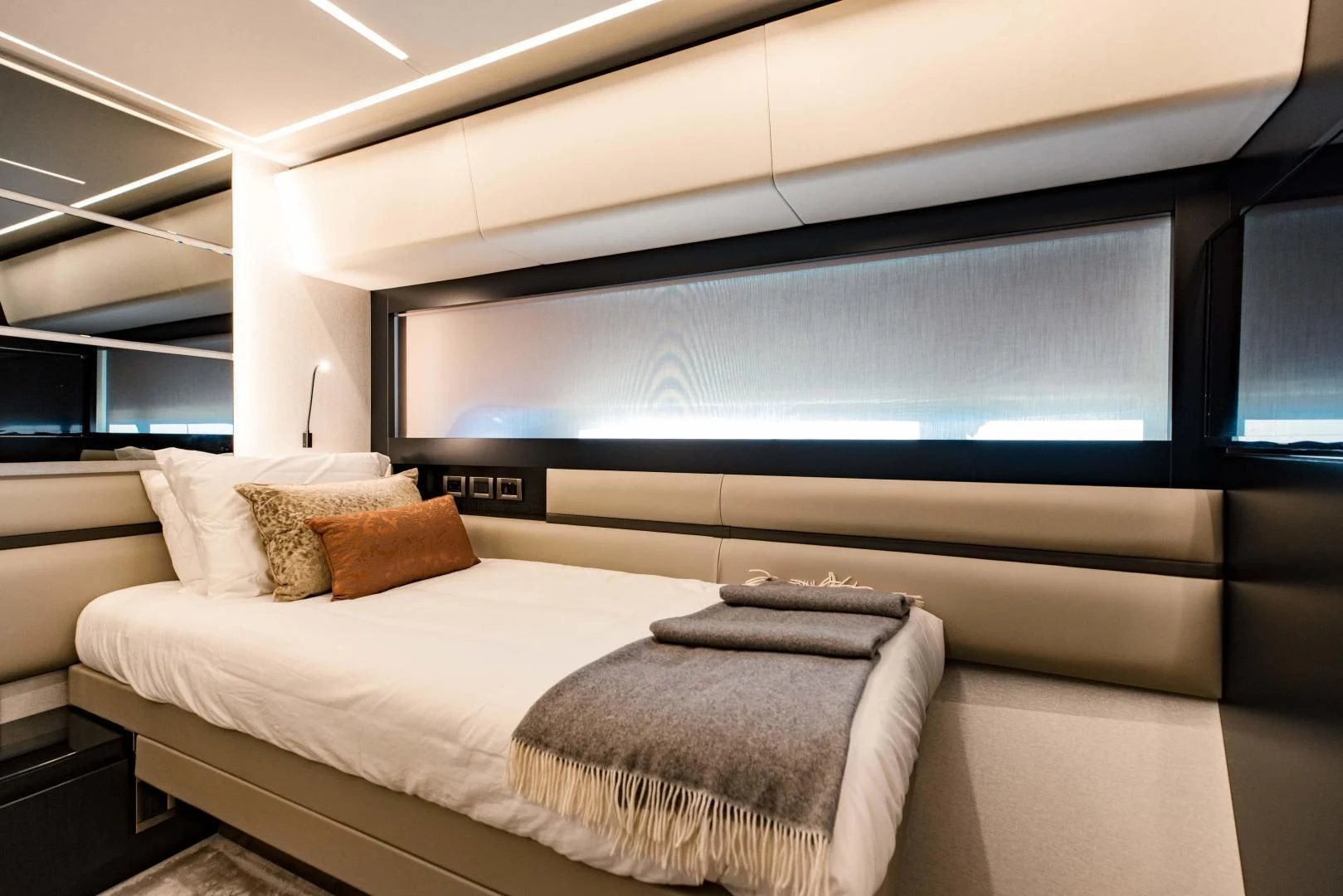 a room with a bed and a tv aboard STALLION Yacht for Sale