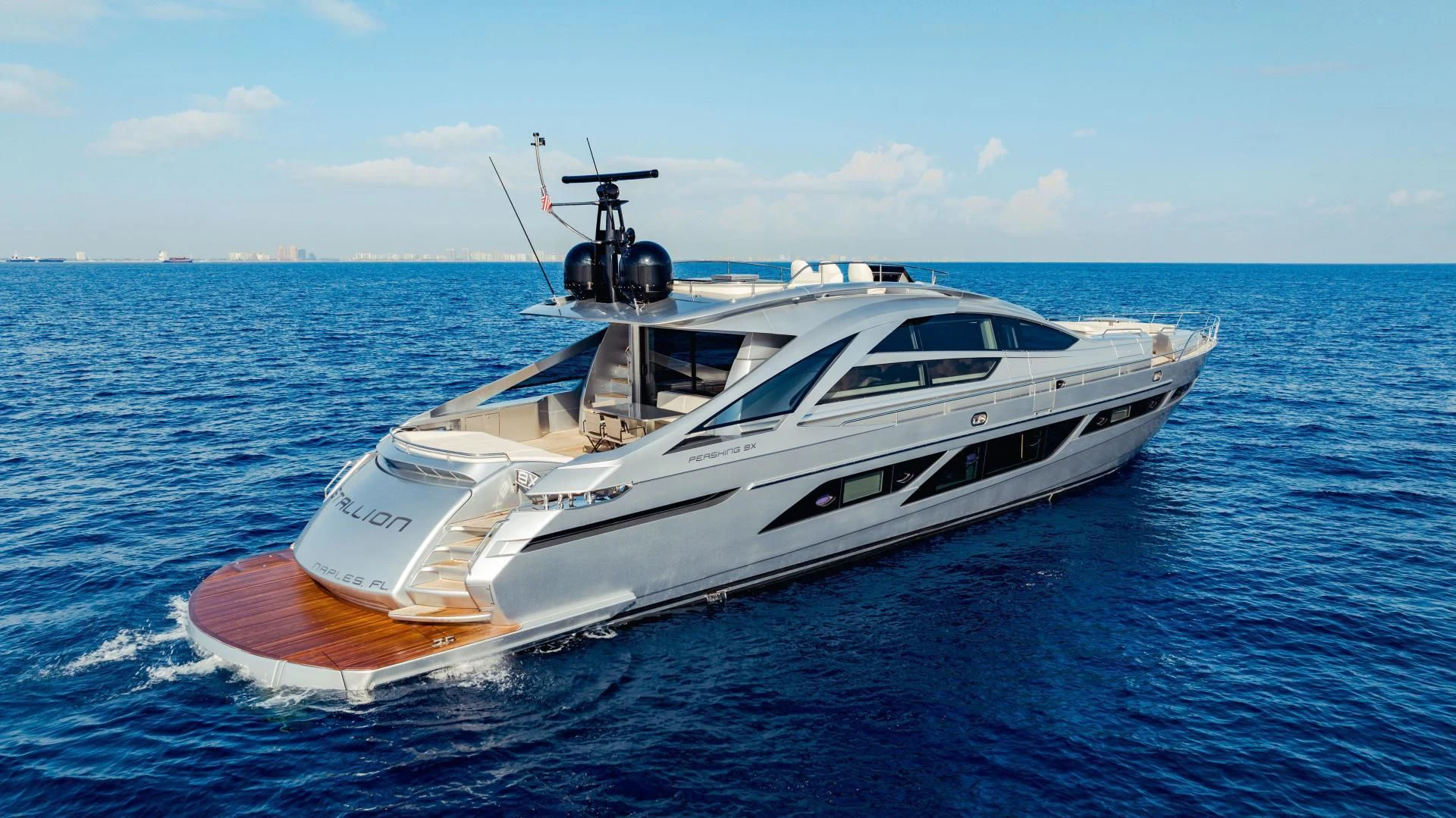 a white boat in the water aboard STALLION Yacht for Sale