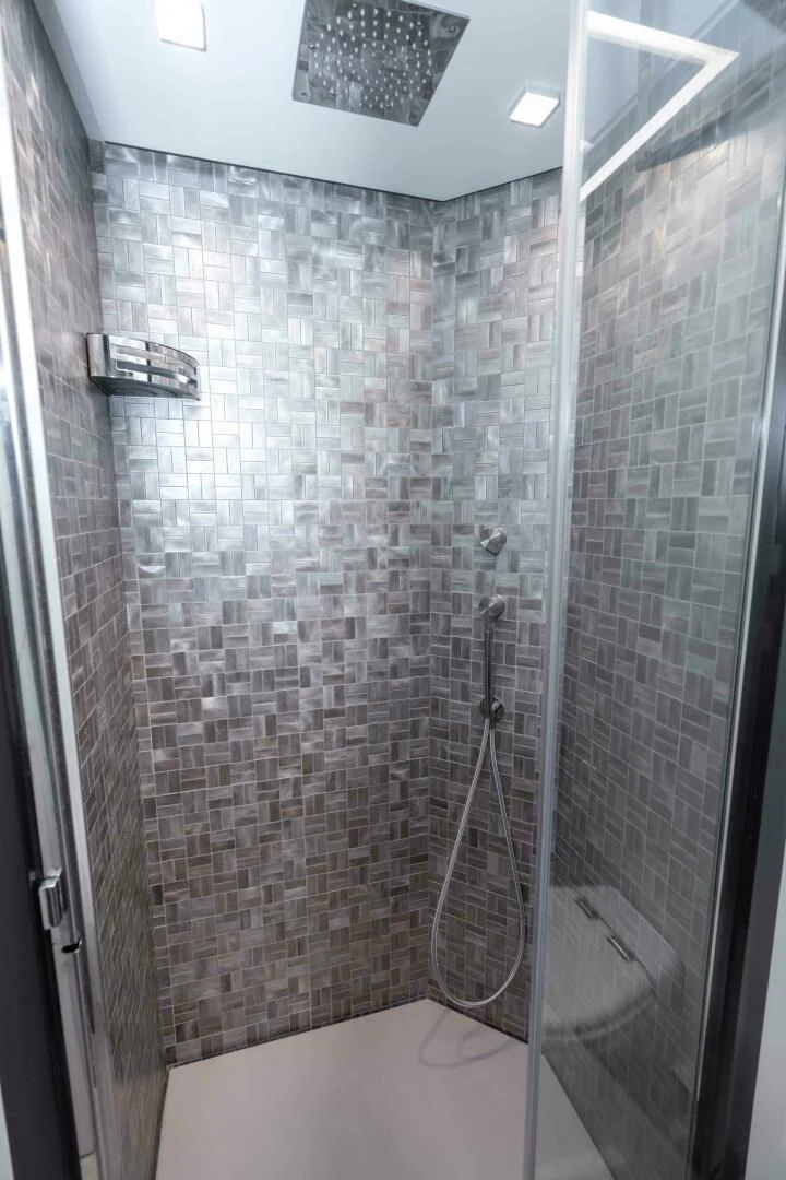 a shower with a glass door aboard STALLION Yacht for Sale