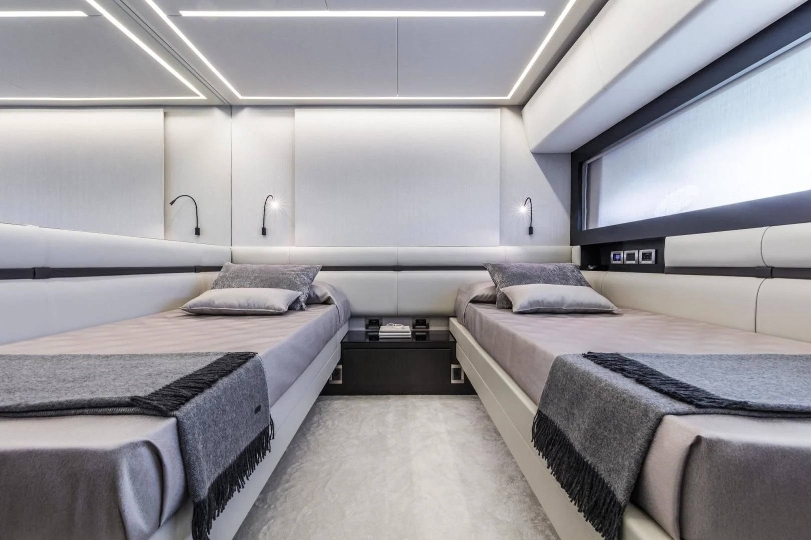 a room with two beds aboard STALLION Yacht for Sale