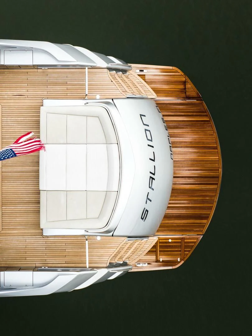 a white object with a red and black flag on it aboard STALLION Yacht for Sale