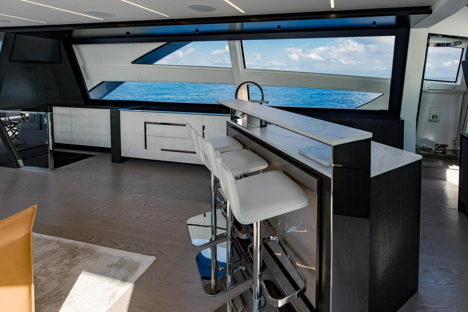 a room with a table and chairs aboard STALLION Yacht for Sale