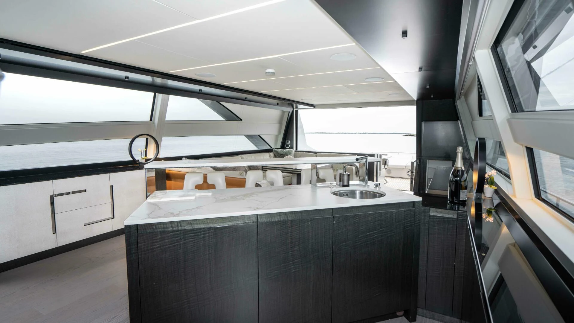 a kitchen with a large window aboard STALLION Yacht for Sale