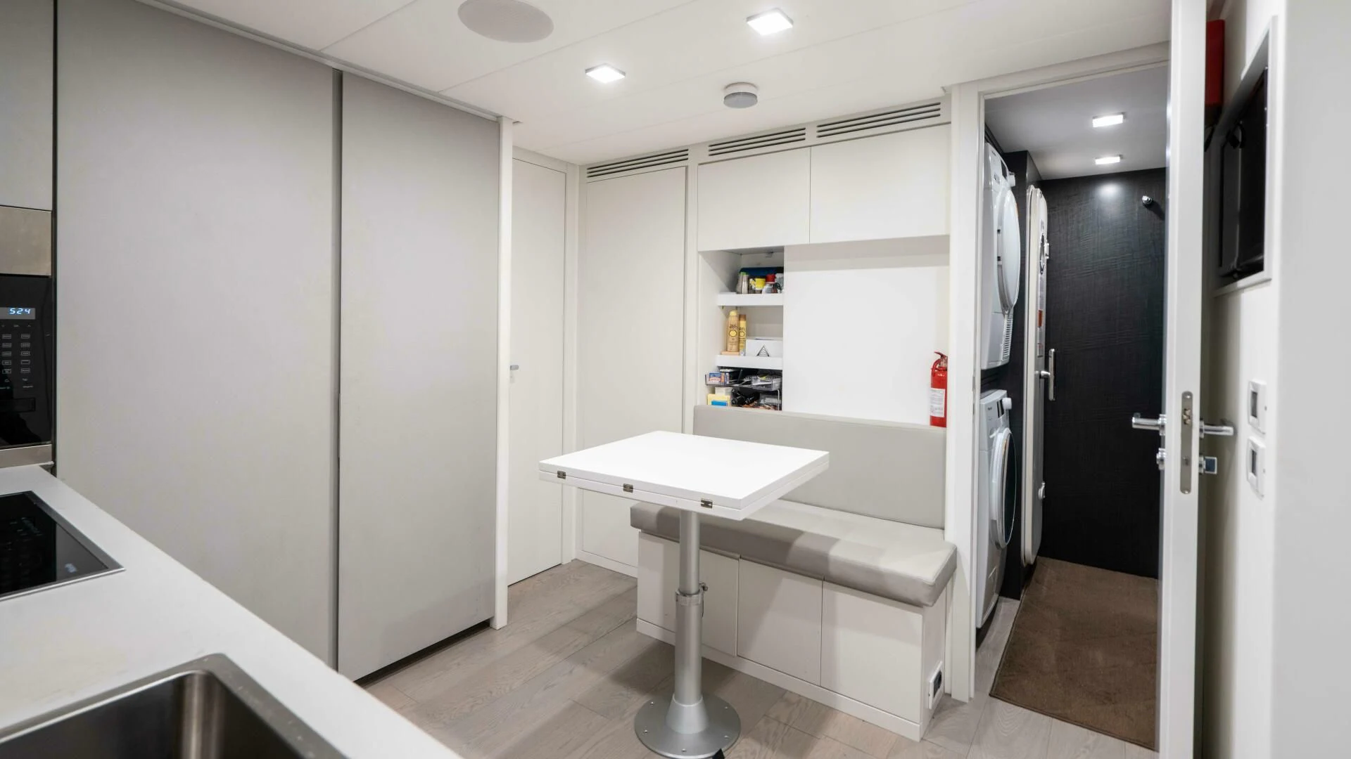 a white table in a room aboard STALLION Yacht for Sale