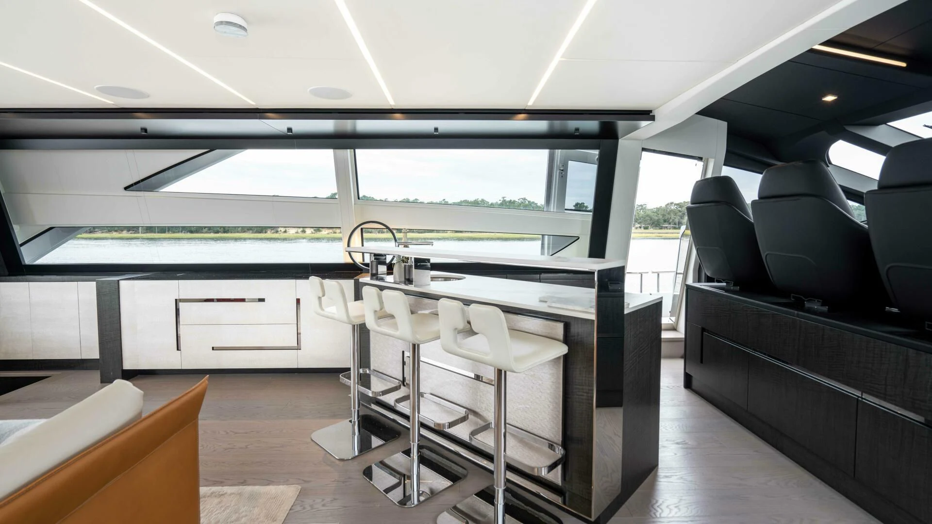 inside of a building with chairs and tables aboard STALLION Yacht for Sale