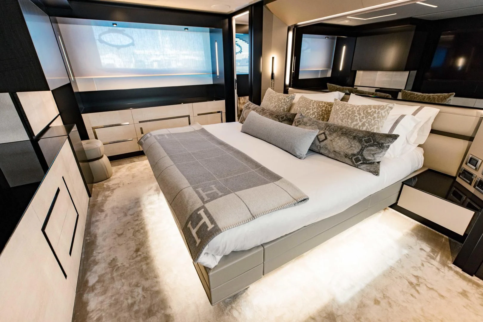 a bed with a white sheet aboard STALLION Yacht for Sale