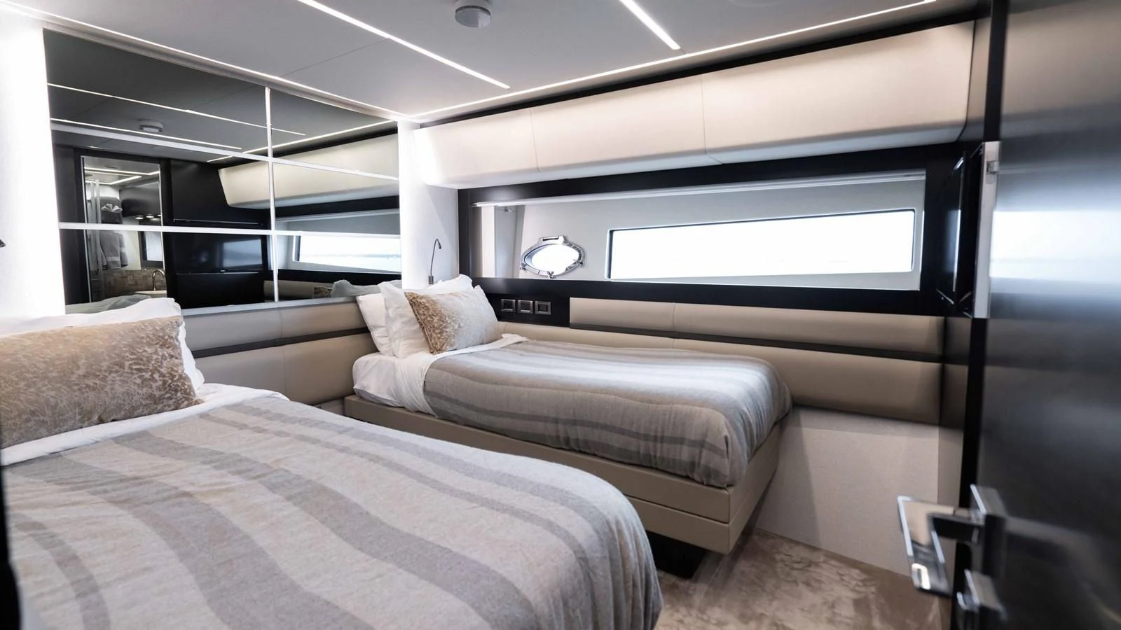 a room with two beds aboard STALLION Yacht for Sale