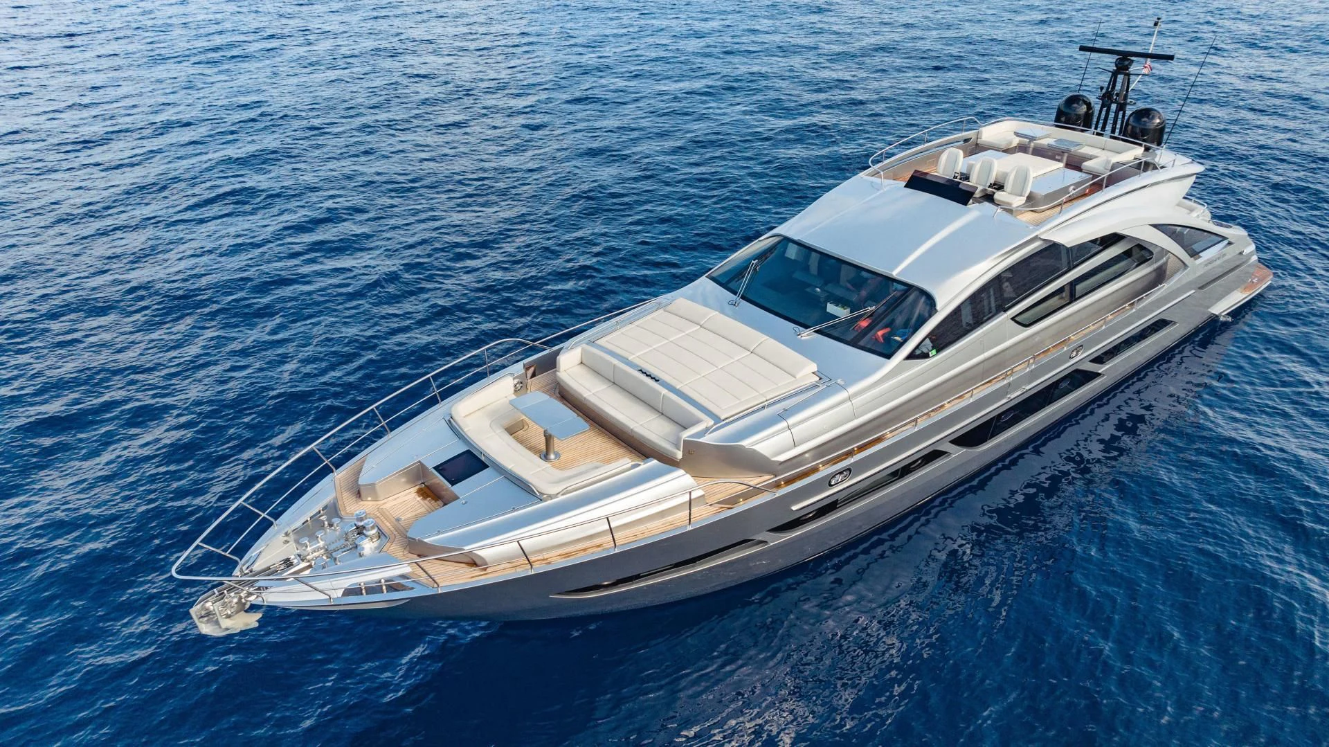 a white boat in the water aboard STALLION Yacht for Sale