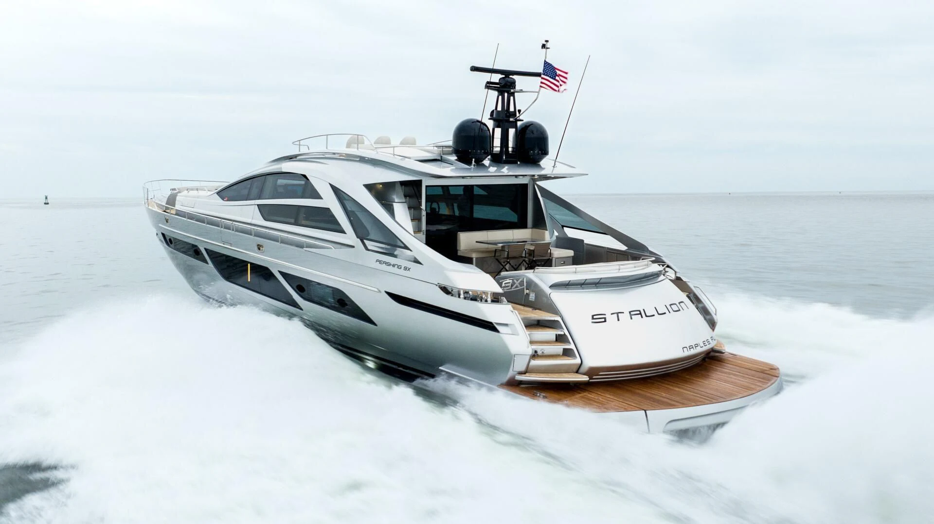 a white yacht on the snow aboard STALLION Yacht for Sale
