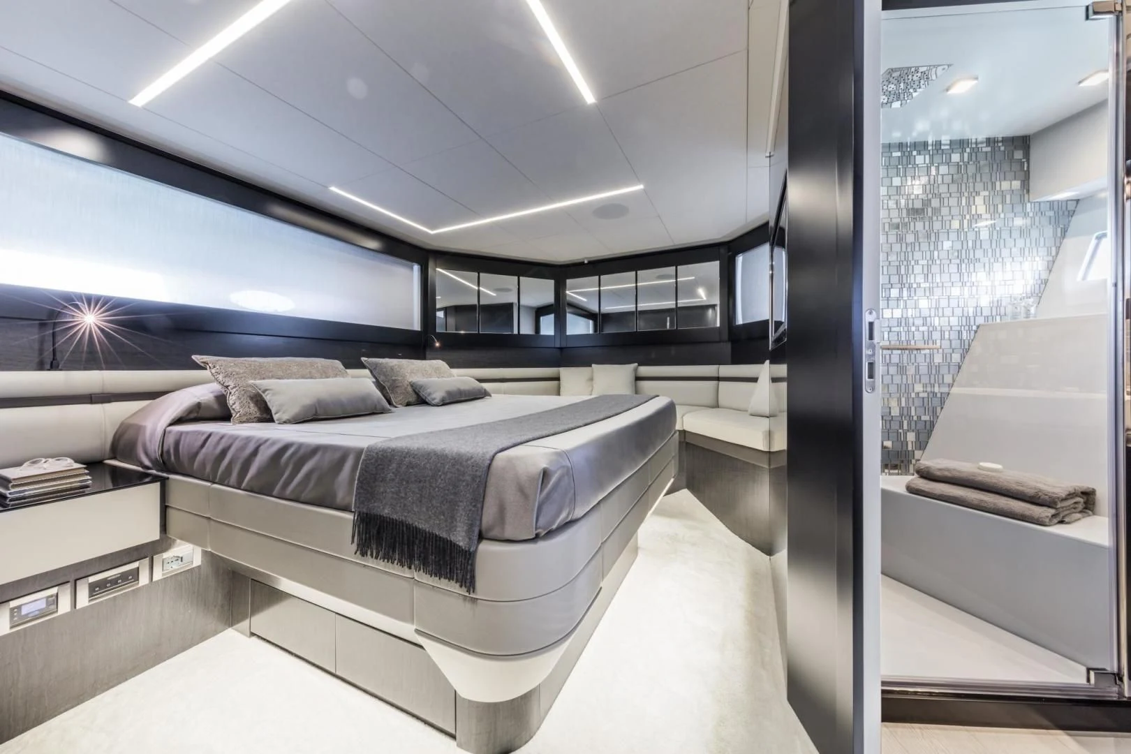 a bedroom with a large bed aboard STALLION Yacht for Sale