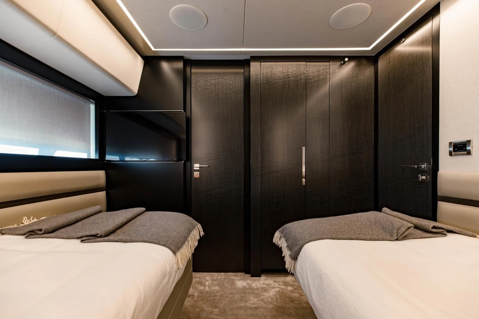 a room with two beds aboard STALLION Yacht for Sale