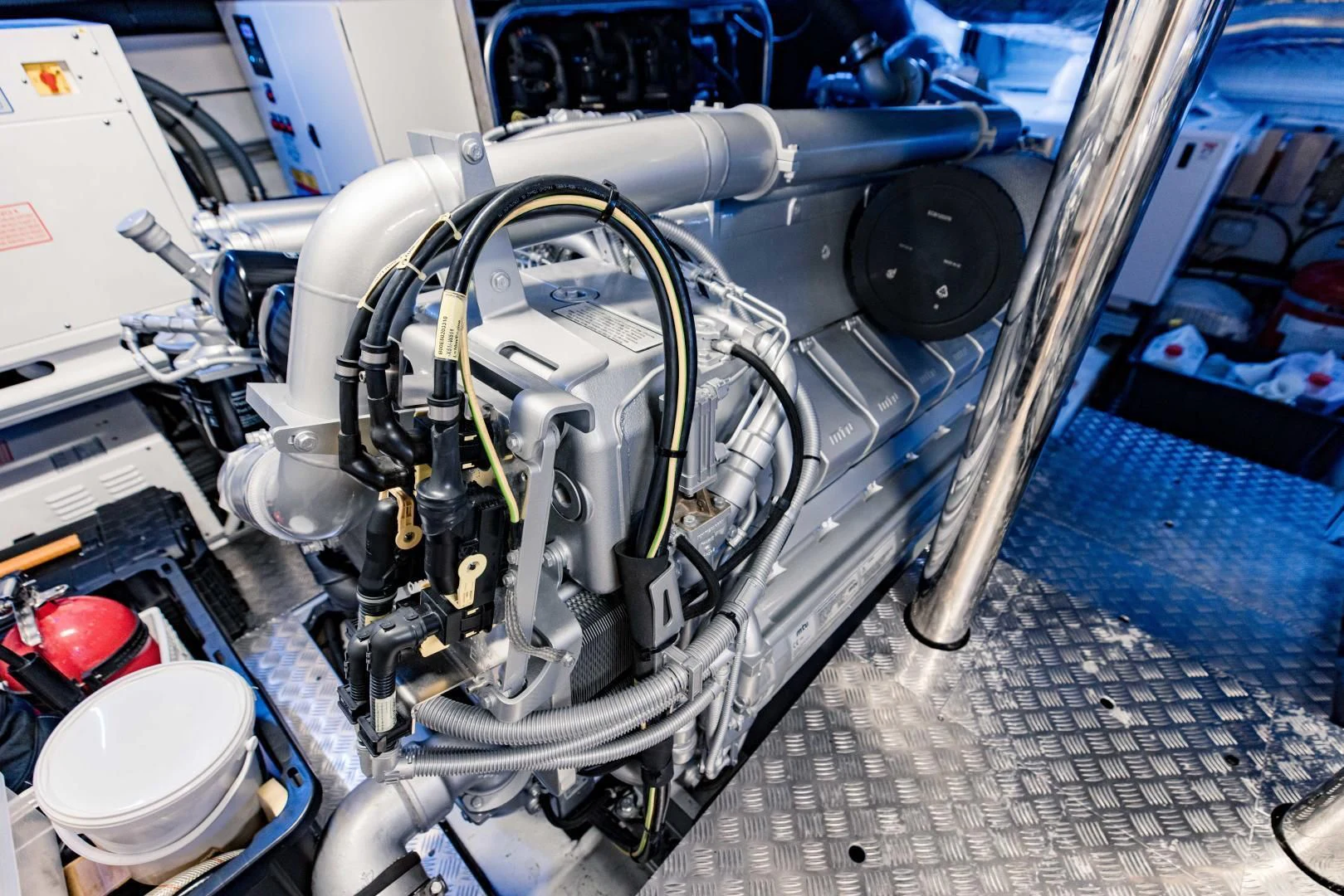 a car with a large engine aboard STALLION Yacht for Sale