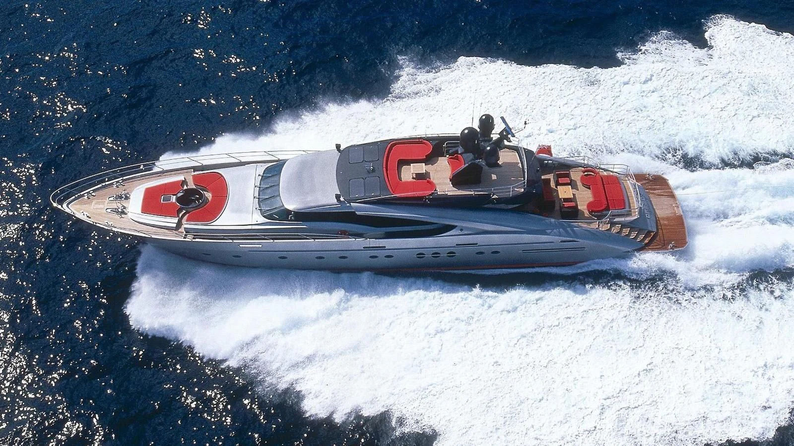 a snowboard on a snowy mountain aboard DRAGON Yacht for Sale