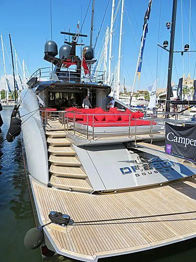 a boat with a staircase on the deck aboard DRAGON Yacht for Sale