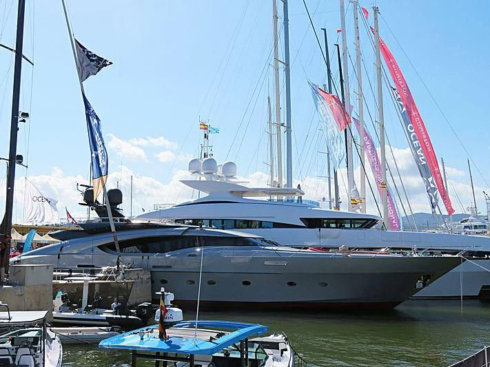 a boat with a flag on it aboard DRAGON Yacht for Sale
