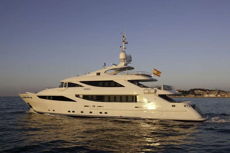 a white yacht on the water aboard AZIZA Yacht for Sale