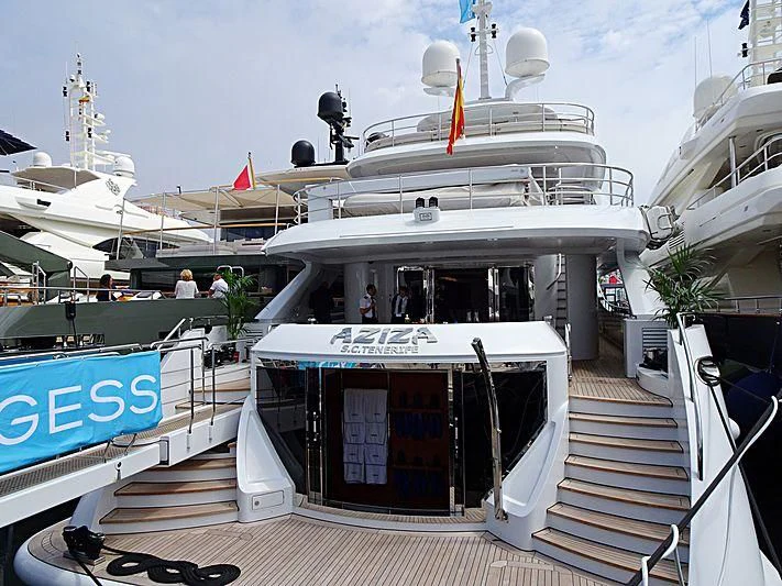 a boat with a deck and a staircase aboard AZIZA Yacht for Sale