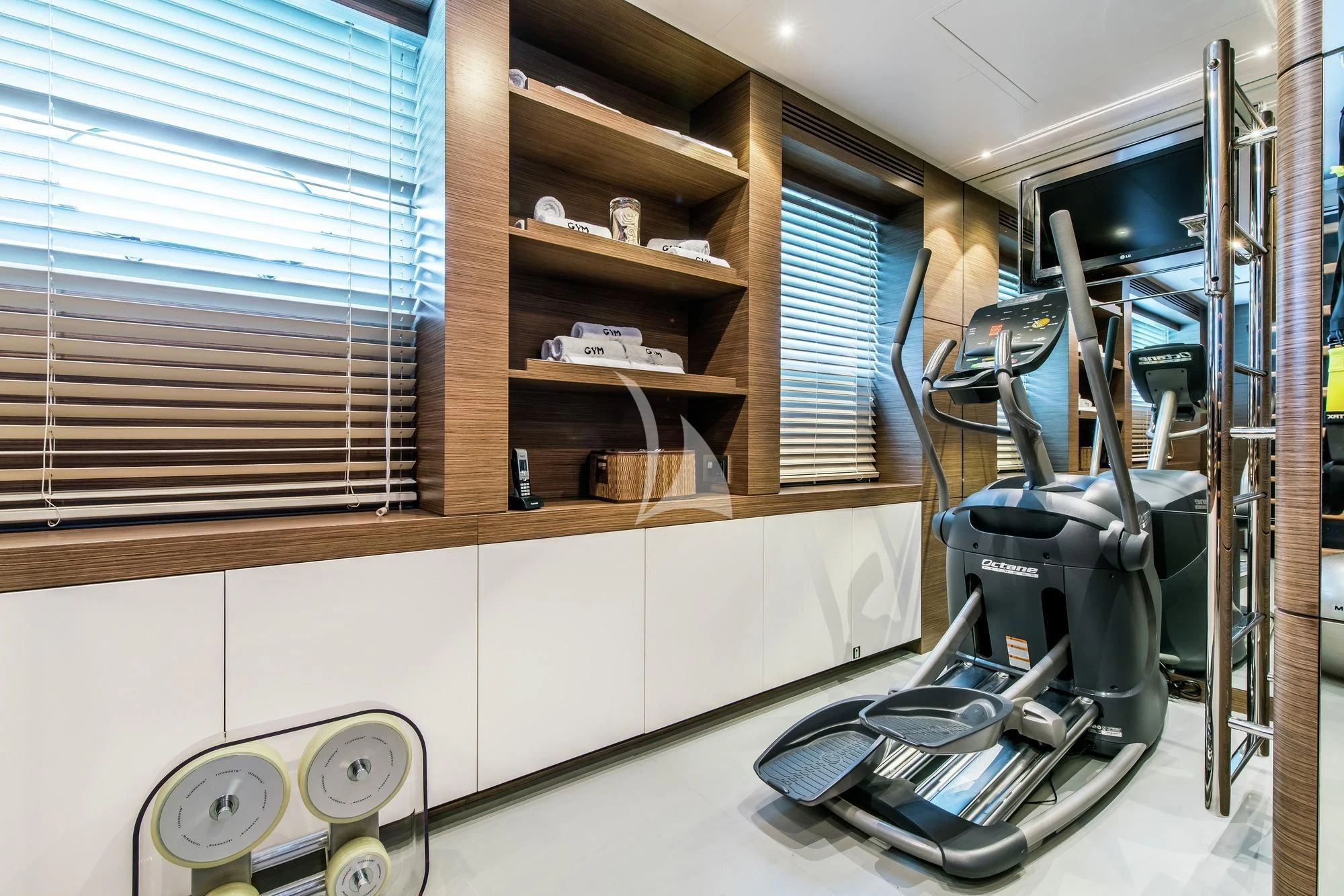 a machine in a room aboard AZIZA Yacht for Sale