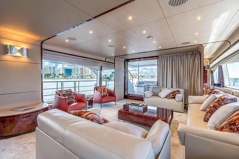 a living room with a large window aboard BLACKJACK Yacht for Sale