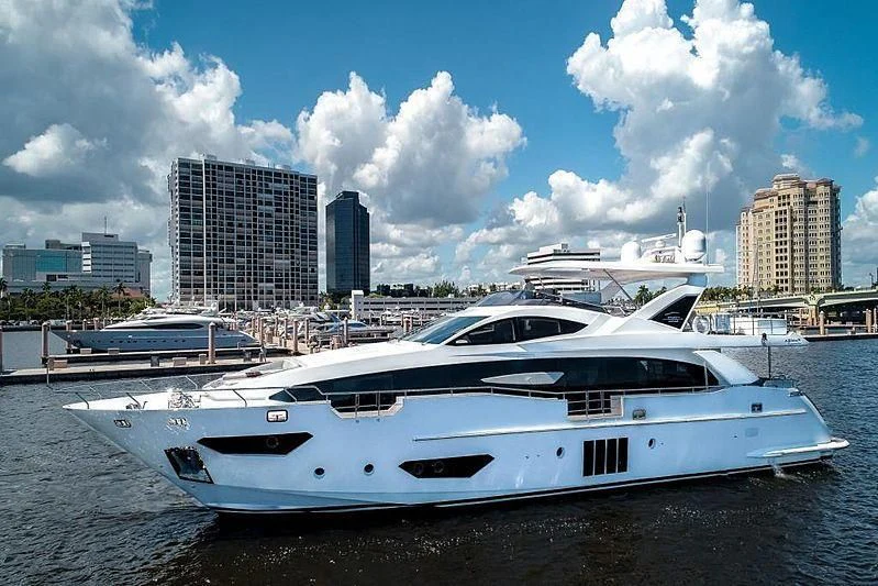 a yacht parked on the shore aboard BLACKJACK Yacht for Sale