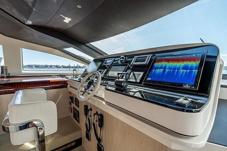 a large screen on a vehicle aboard BLACKJACK Yacht for Sale