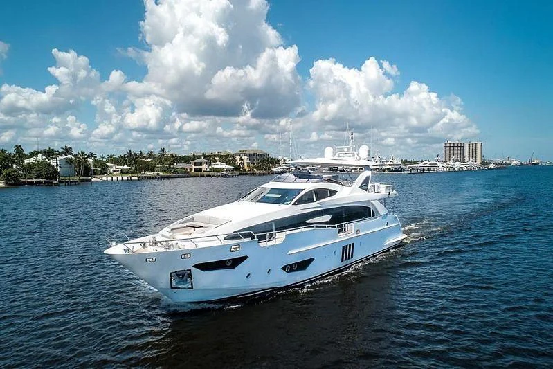 a white yacht in the water aboard BLACKJACK Yacht for Sale