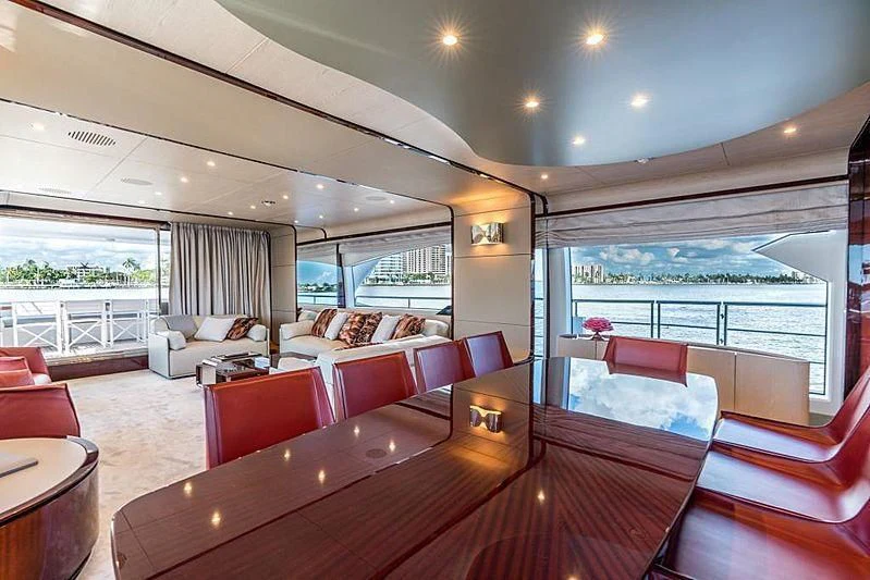 a living room with a large window aboard BLACKJACK Yacht for Sale