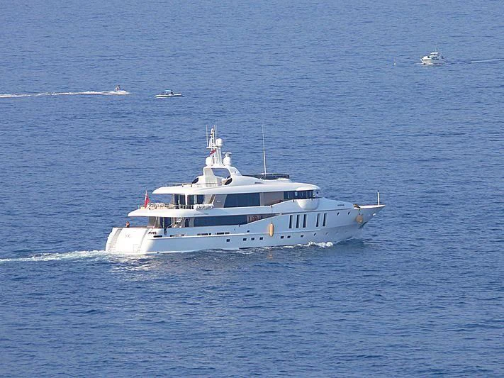 a white boat on the water aboard MY SAGA Yacht for Sale