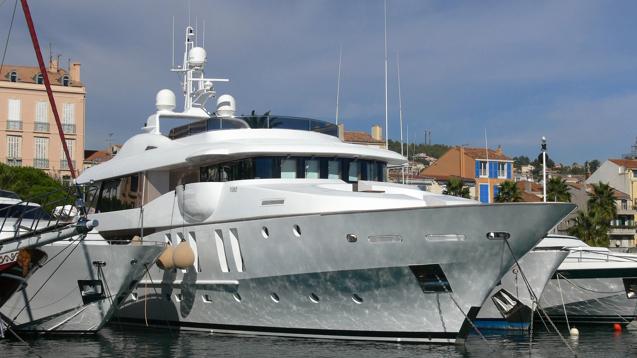 a boat docked in a harbor aboard MY SAGA Yacht for Sale