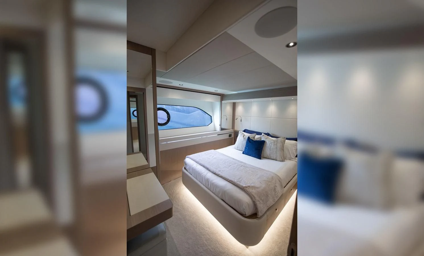 a room with a bed and a window aboard MILAMO Yacht for Sale