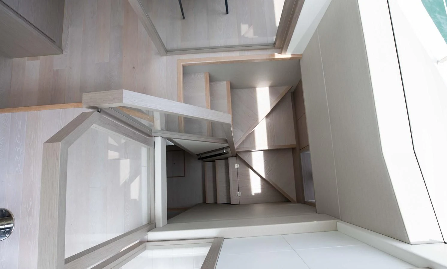 a staircase in a building aboard MILAMO Yacht for Sale