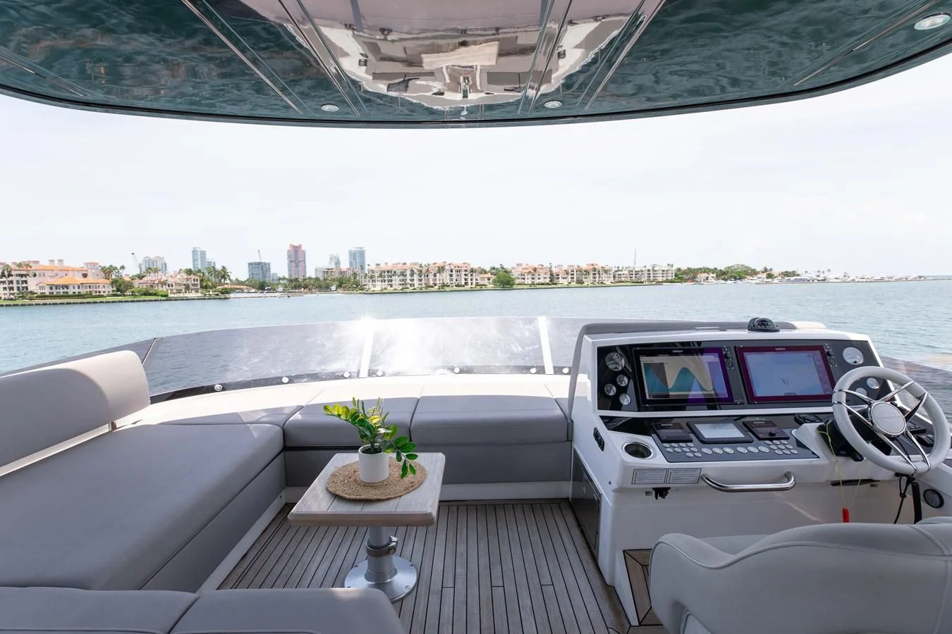 a car on a deck aboard MILAMO Yacht for Sale