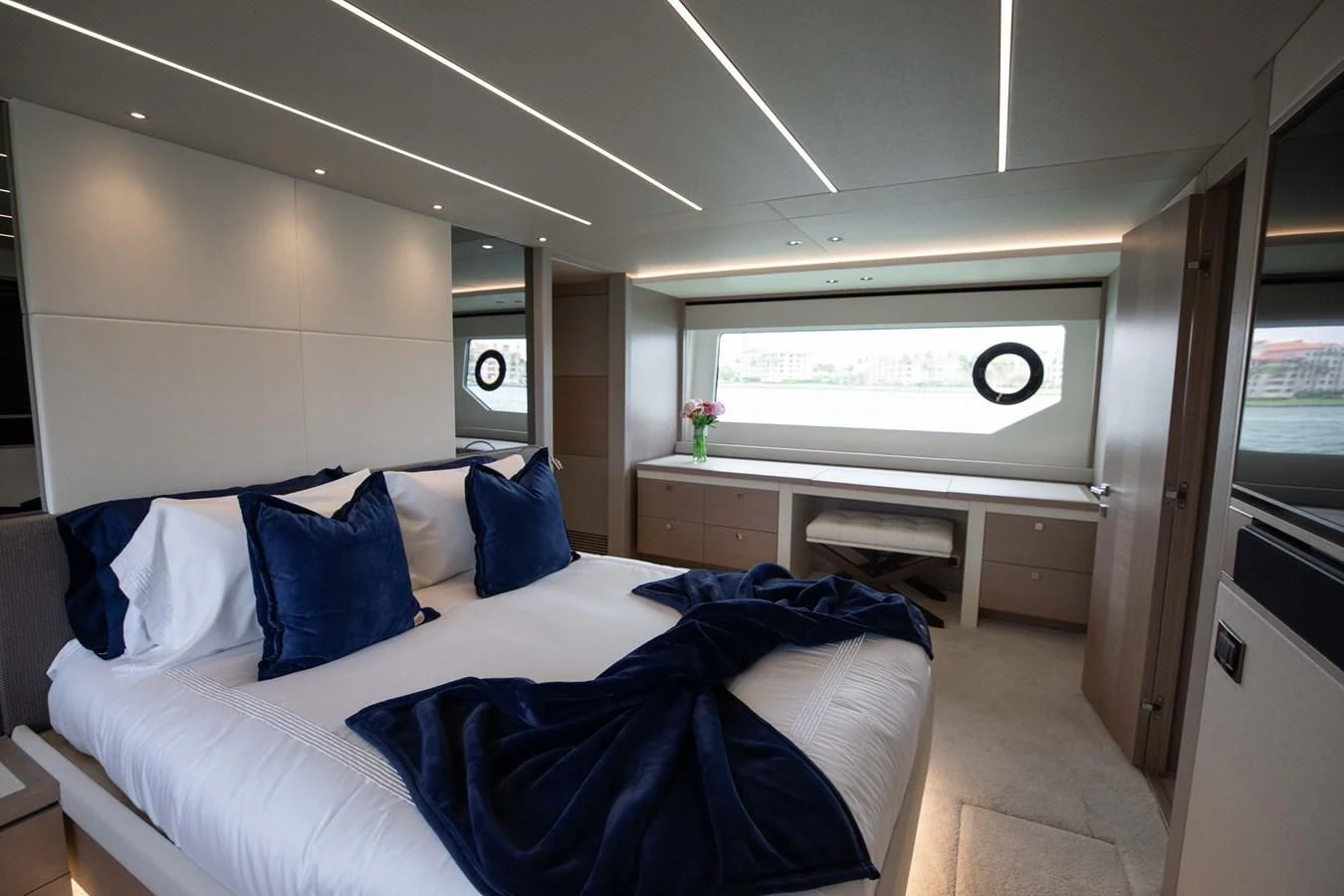 a bed in a room aboard MILAMO Yacht for Sale