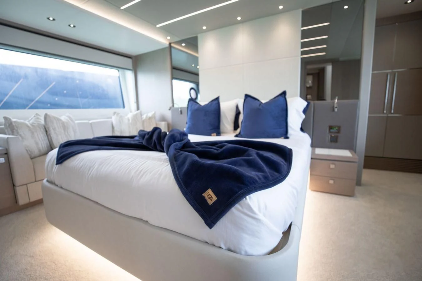 a room with beds and a window aboard MILAMO Yacht for Sale