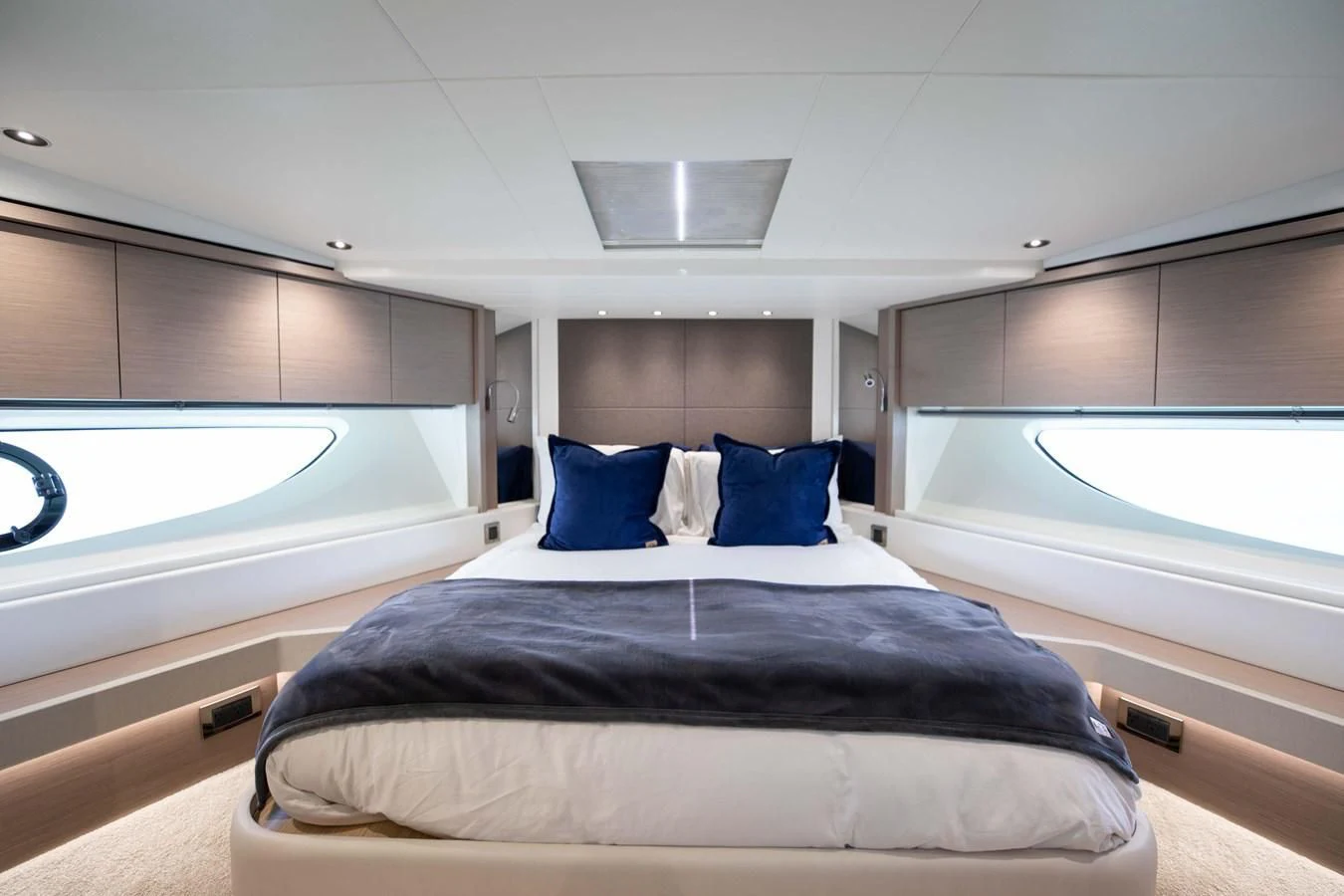 a bed in a room aboard MILAMO Yacht for Sale