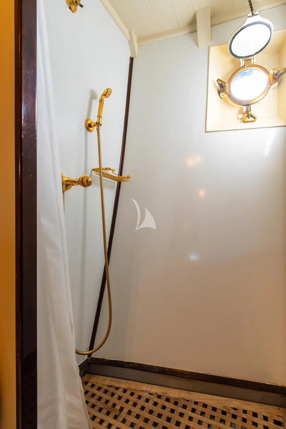 a door with a light fixture aboard D.P. MONITOR Yacht for Sale