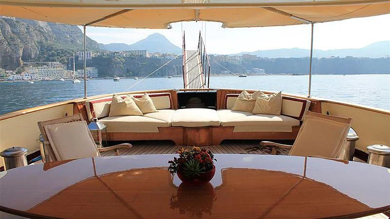 a large boat with a large bridge in the background aboard D.P. MONITOR Yacht for Sale