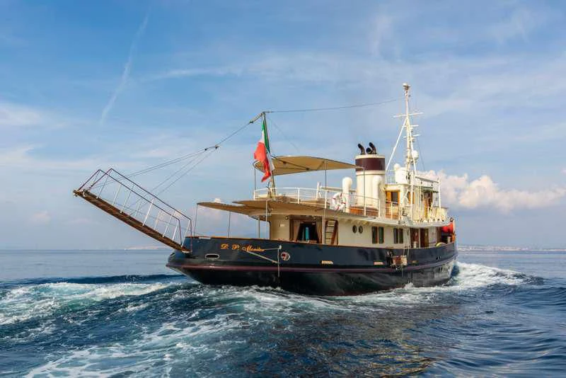 a boat in the water aboard D.P. MONITOR Yacht for Sale