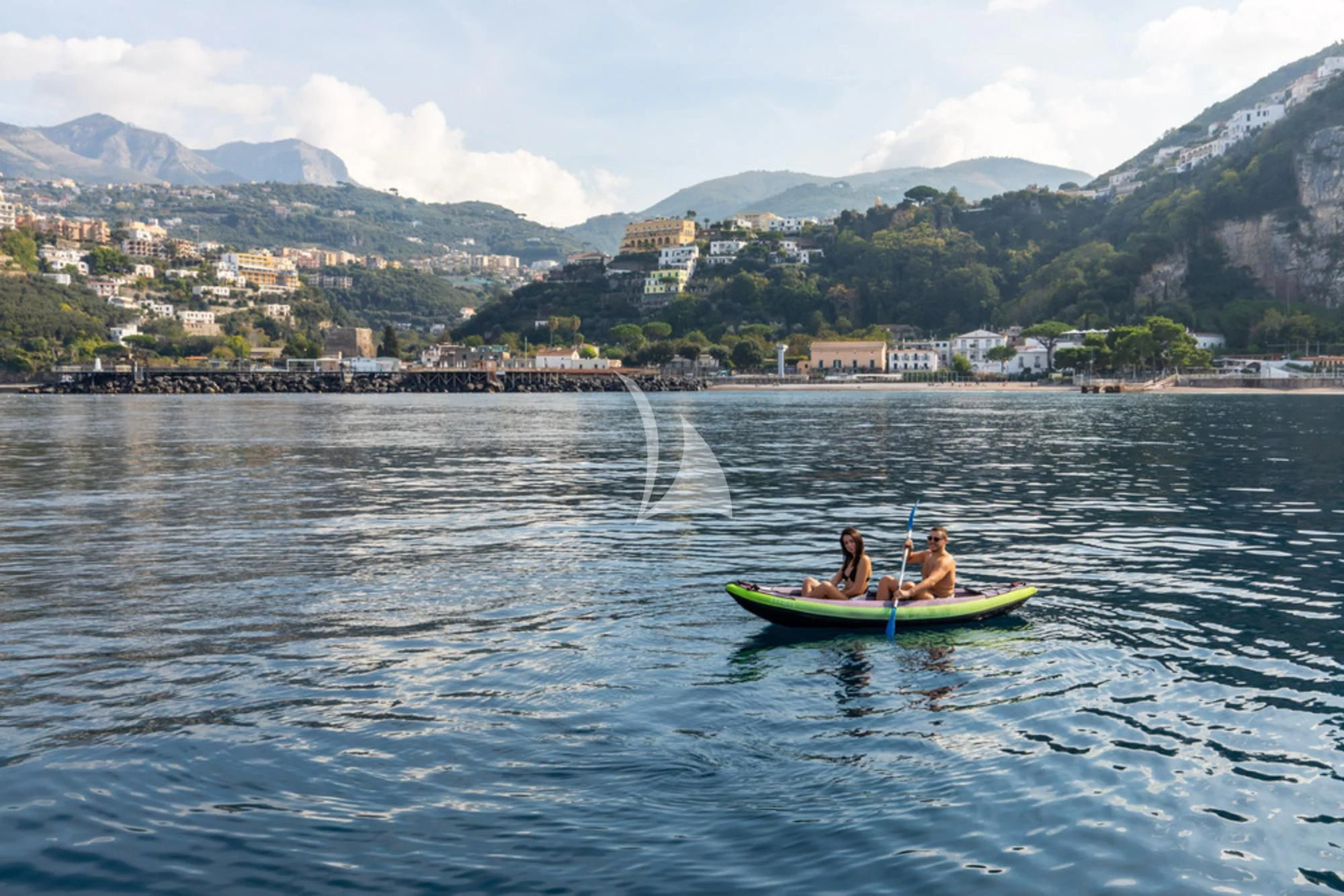 a group of people in a boat on a lake aboard D.P. MONITOR Yacht for Sale