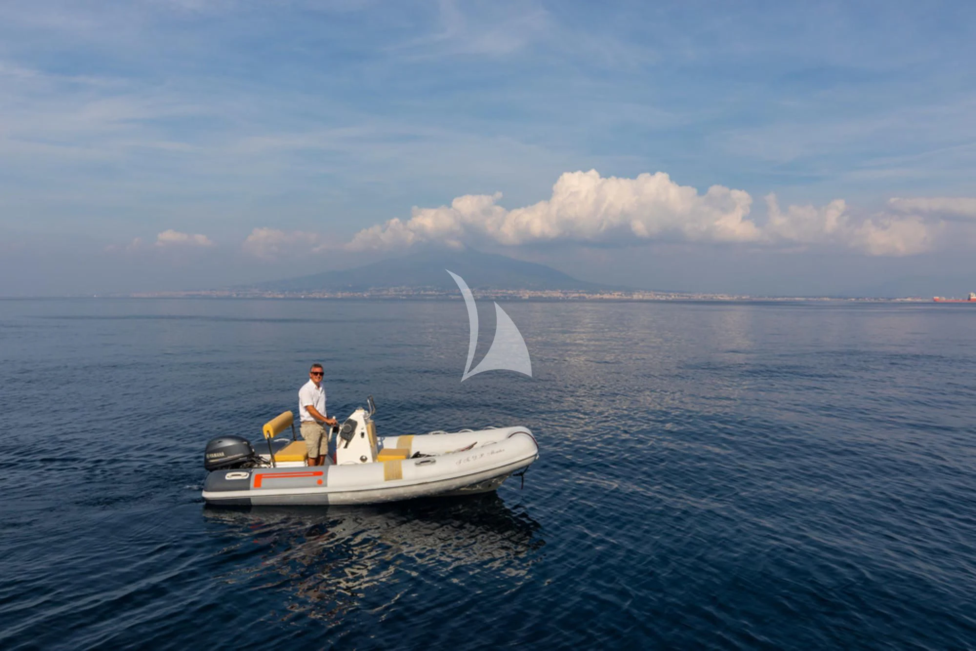 a man and a woman on a boat in the water aboard D.P. MONITOR Yacht for Sale