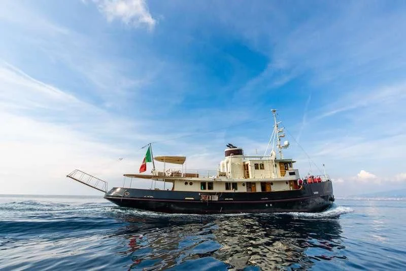 a boat in the water aboard D.P. MONITOR Yacht for Sale