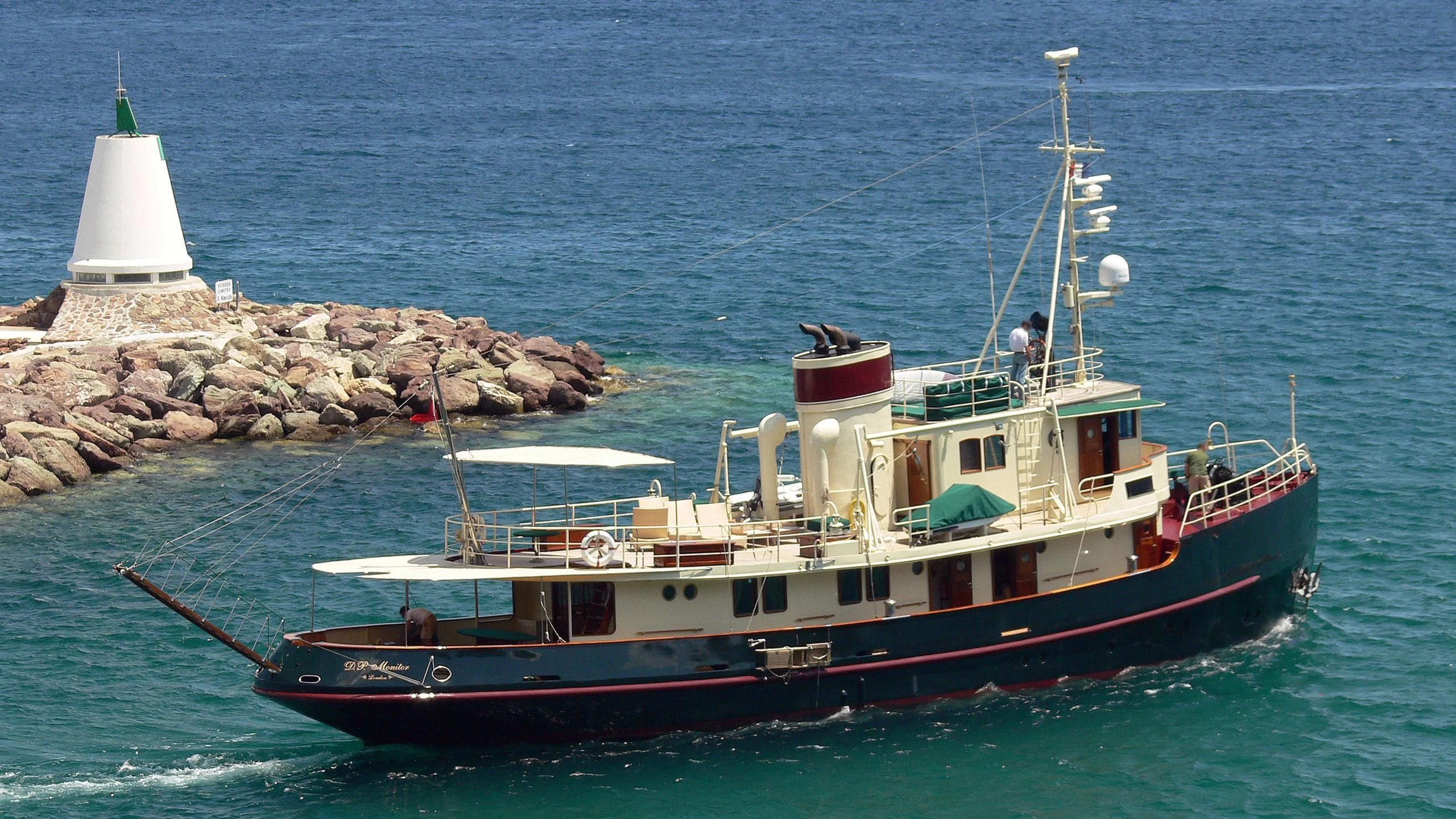 a boat on the water aboard D.P. MONITOR Yacht for Sale