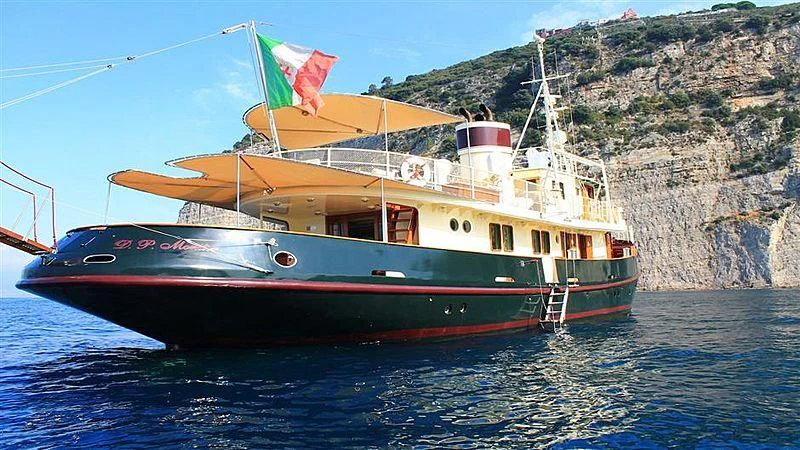 a boat on the water aboard D.P. MONITOR Yacht for Sale