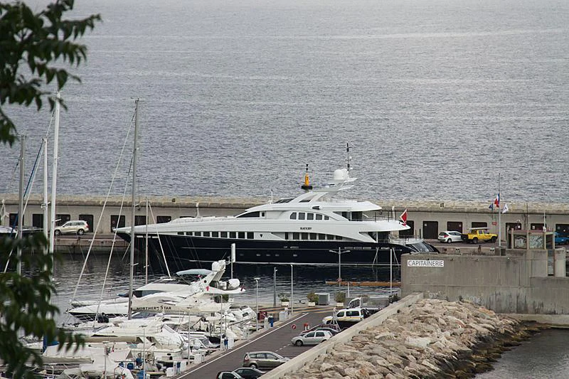 a boat docked at a pier aboard BLISS Yacht for Sale